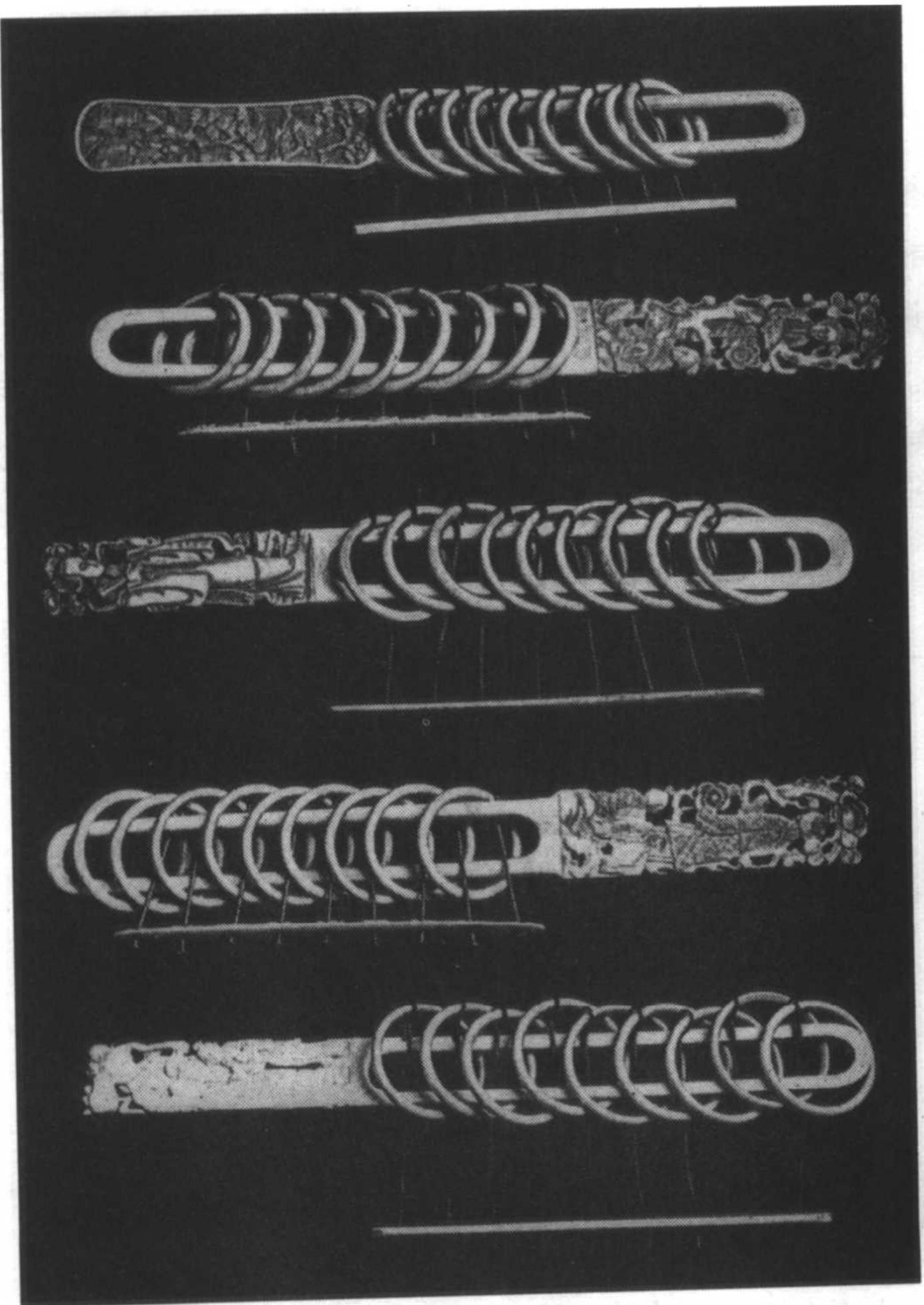 Historical photograph of ornate Nine Linked Rings objects